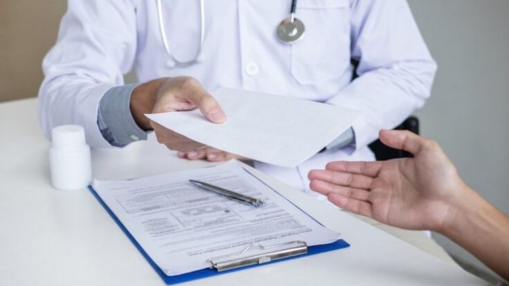 doctor prescribes treatment for parasites